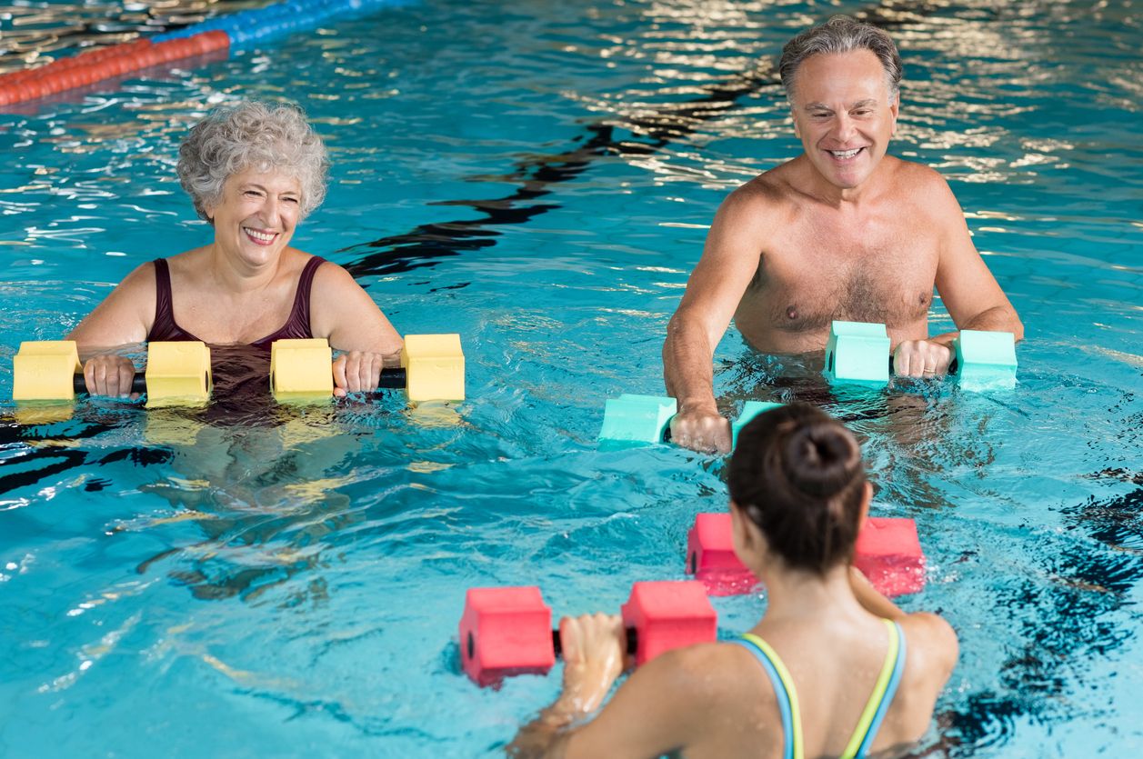 Seniors doing aqua aerobics Andrews heating hire keep Clacton leisure centre warm
