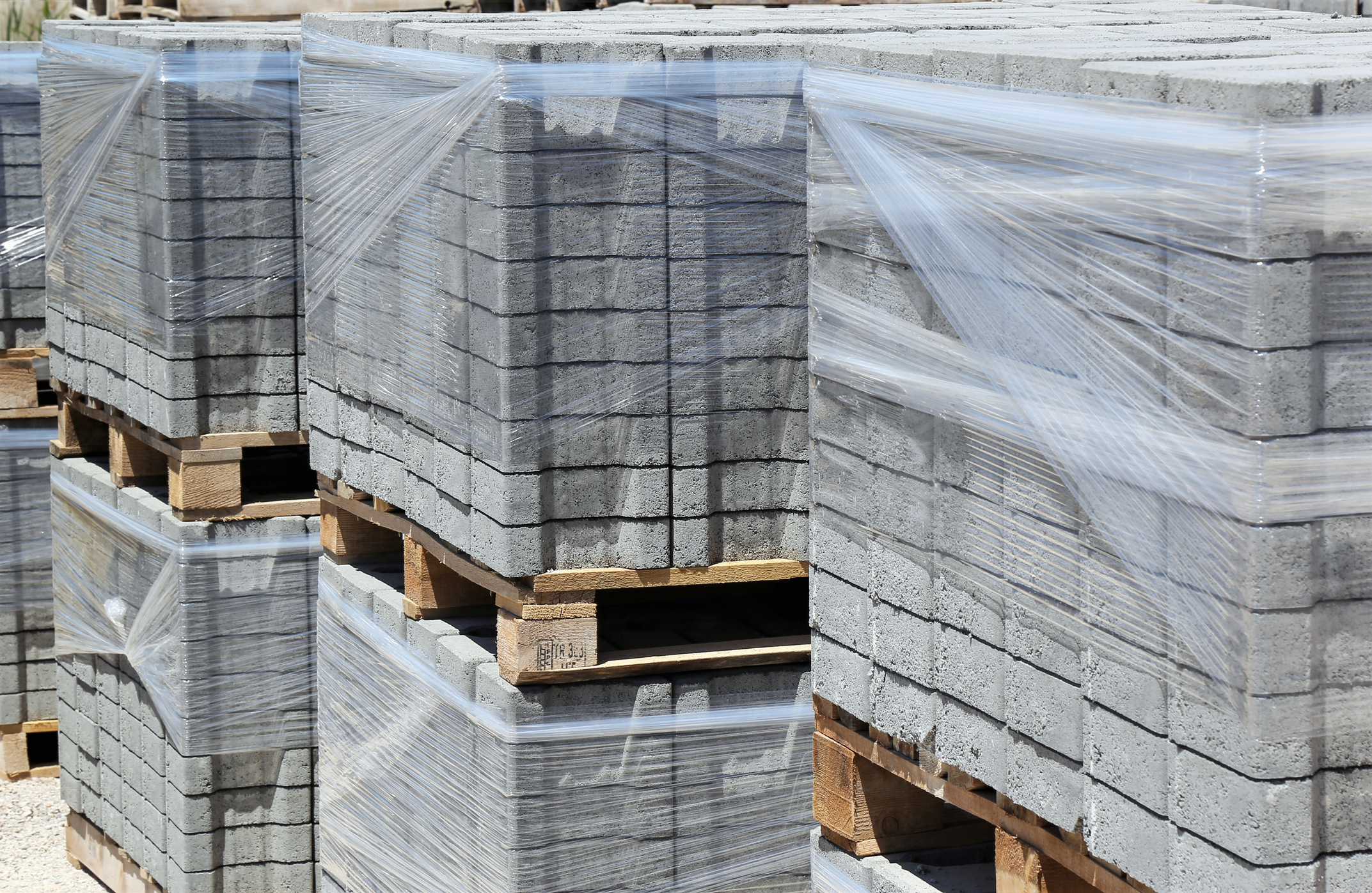 Packed cobblestones on pallets Andrews Sykes provides heating for construction company