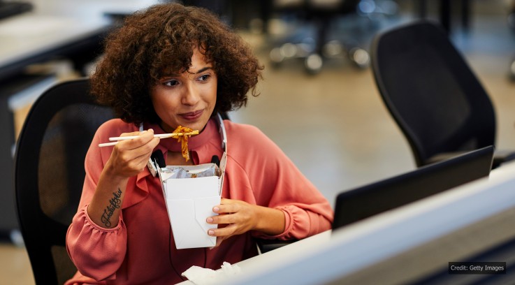 Businesswoman Eating in Her Office How to kill the chill this winter: Office Tactics