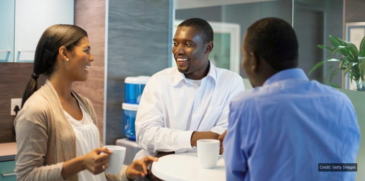 African business colleagues having coffee together. How to kill the chill this winter: Office Tactics