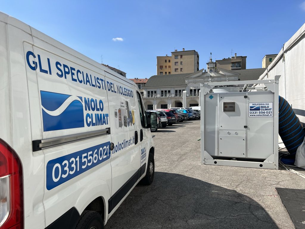 Backstage air conditioning configuration by Nolo Climat team Nolo Climat team configuring air conditioning units for backstage comfort
