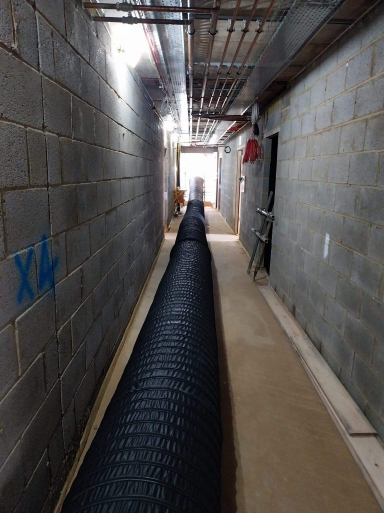 Drying out damp: Andrews Sykes keeps housing project on track