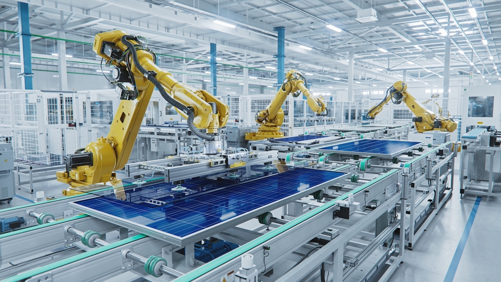 Industrial robotics in action on an automated production line, assembling solar panels, illustrating advanced manufacturing processes in a well-ventilated industrial environment.
