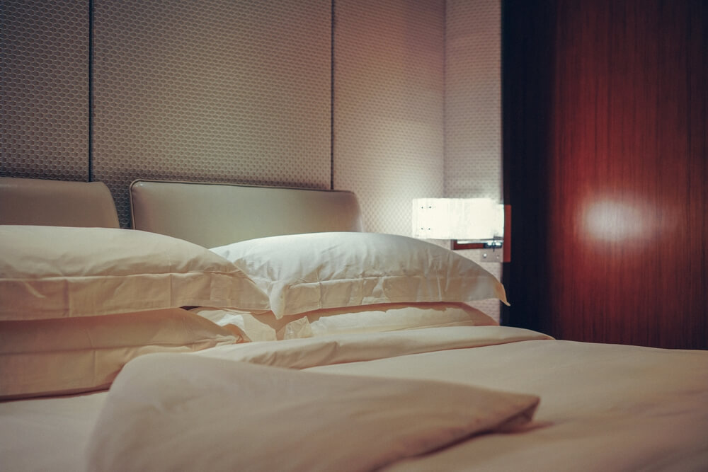 Luxurious hotel guest room with portable air conditioning hire used to pre-cool space before guest check-in